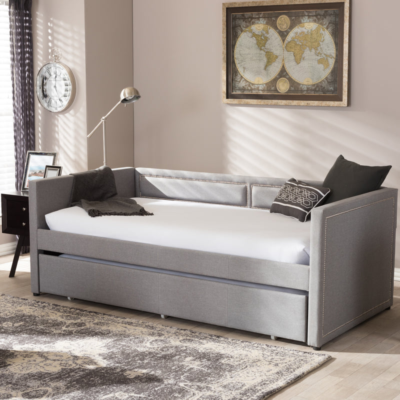 Raymond Sofa Daybed - Modern Grey Fabric Design with Nail Head Trim and Roll-Out Trundle for Guest Bed Convenience