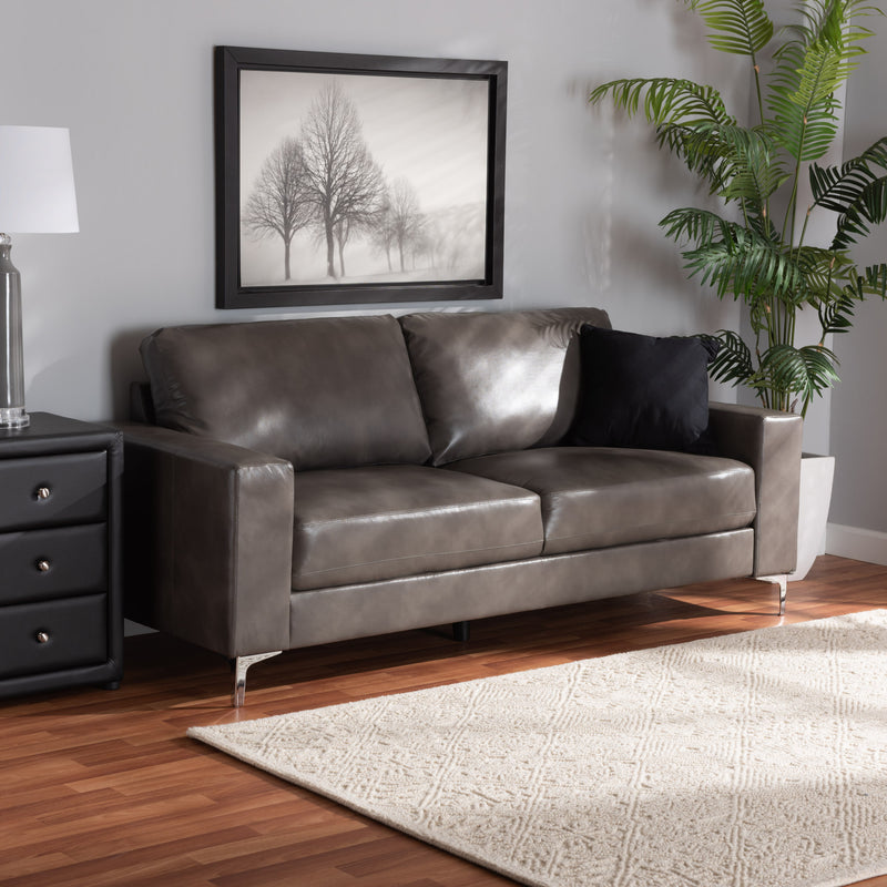 Rayan Loveseat Modern Grey Faux Leather Upholstered with Silver Finished Metal Frame for Stylish Living Room Seating